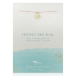 Lucky Feather Shell Necklace on display card reading "Protect and heal like a seashell, I'm always here for you". Gold shell charm on nylon cord.