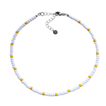 Paradise Yellow is a single strand white seed bead choker necklace with yellow accent beads and displayed on a white background.