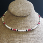 Siren Necklace is a surf style seed bead necklace with white, red, & black beads