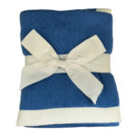 Dreamsoft Organic Cotton Travel Scarf French Blue in color with white band shown as displayed in store, folded and tied with white cotton ribbon bow.