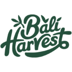 Bali Harvest logo of company name in dark green script lettering with plant leaf accents.