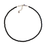 Black Sail choker necklace is a single strand, minimalist seed bead necklace designed with black seed beads. Displayed on white background.