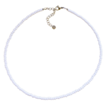 White Sail choker necklace is a single strand, minimalist seed bead necklace designed with white seed beads. Displayed on white background.