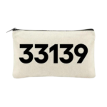 33139 Canvas Zipper Pouch displayed on white background. 33139 is the South Beach zip code and printed on front of pouch in black block letters.