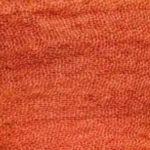 Rubyzaar Burnt Orange Boho Shawl displayed close to show color of fabric.