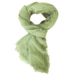 The Boho Shawl Pea Green displayed in knot pattern on white background.