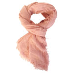 The Boho Shawl Peach displayed in knot pattern on white background.