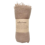 The Boho Shawl Sand rolled up with Rubyzaar packaging of brown paper with product name and description written in black. Displayed on white background.