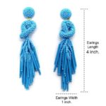 Blue Beaded Knot Post Statement Earrings shown on white background. Displaying the earring length of 4 inches and width of 1 inch. Post earring is made with blue seed and bugle beads and is in a knot pattern with beaded fringe hanging down below the knot.