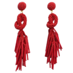 Red Beaded Knot Post Statement Earrings shown on white background. Post earring is made with red seed and bugle beads and is in a knot pattern with beaded fringe hanging down below the knot.